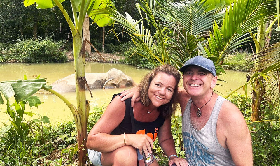 elephants bathing at following giant koh lanta